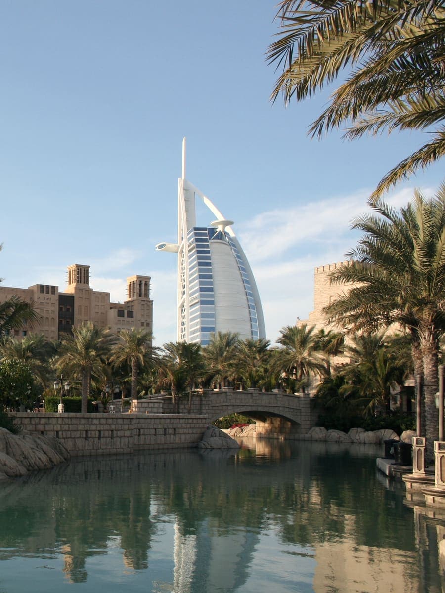 Burj Al Arab rising behind the palms and waterways of Madinat Jumeirah