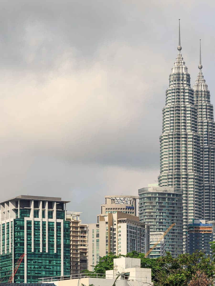 The Petronas Twin Towers above the Kuala Lumpur skyline